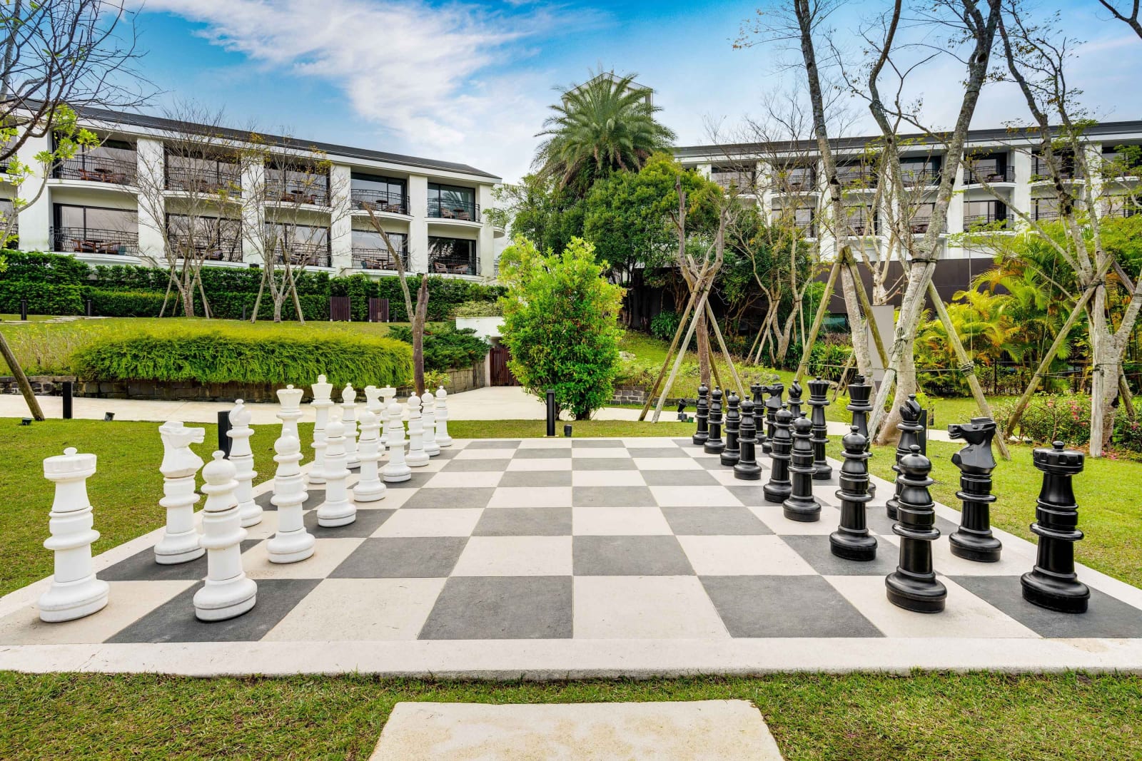 A life-size chess set on the resort lawn