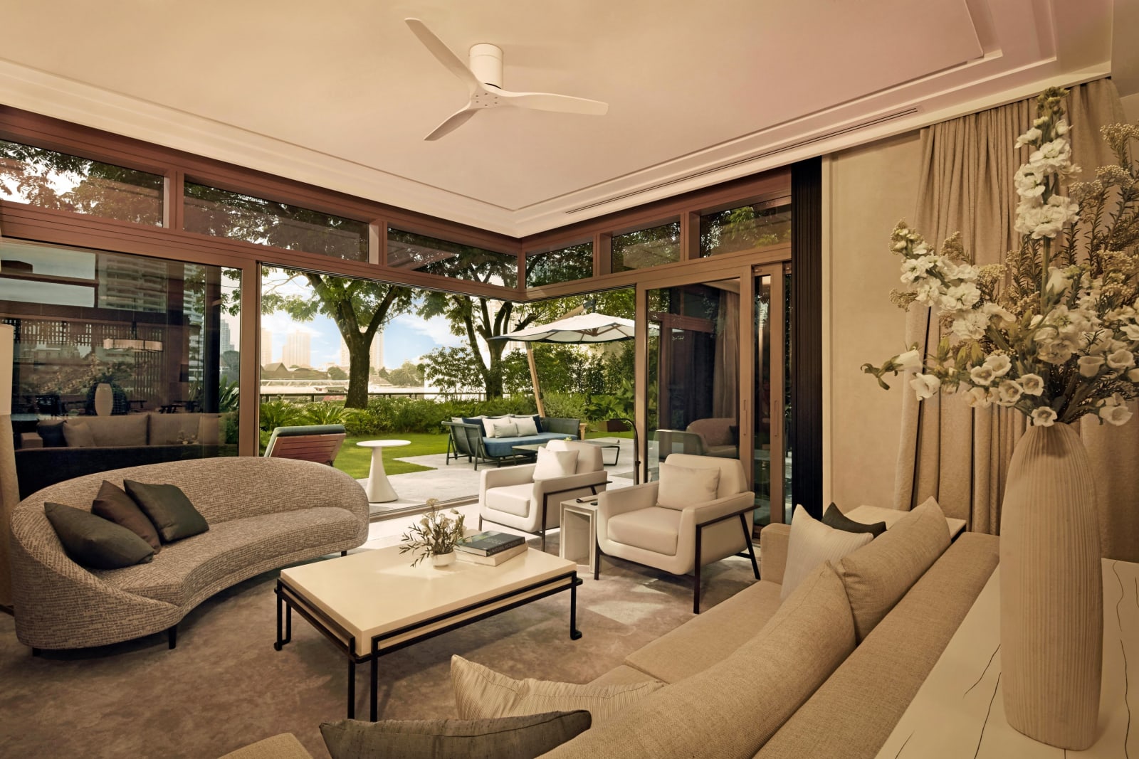 The interior of the Presidential Villa at Capella Bangkok looking toward the river