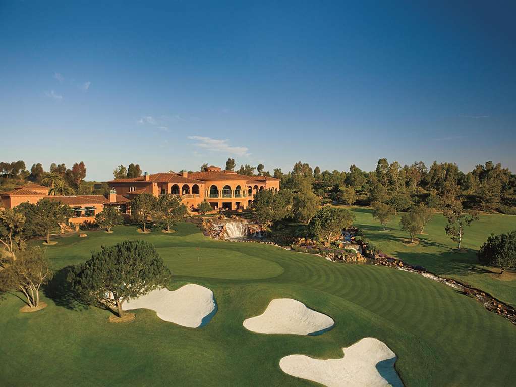 Golf fairway and green with the resort buildings behind