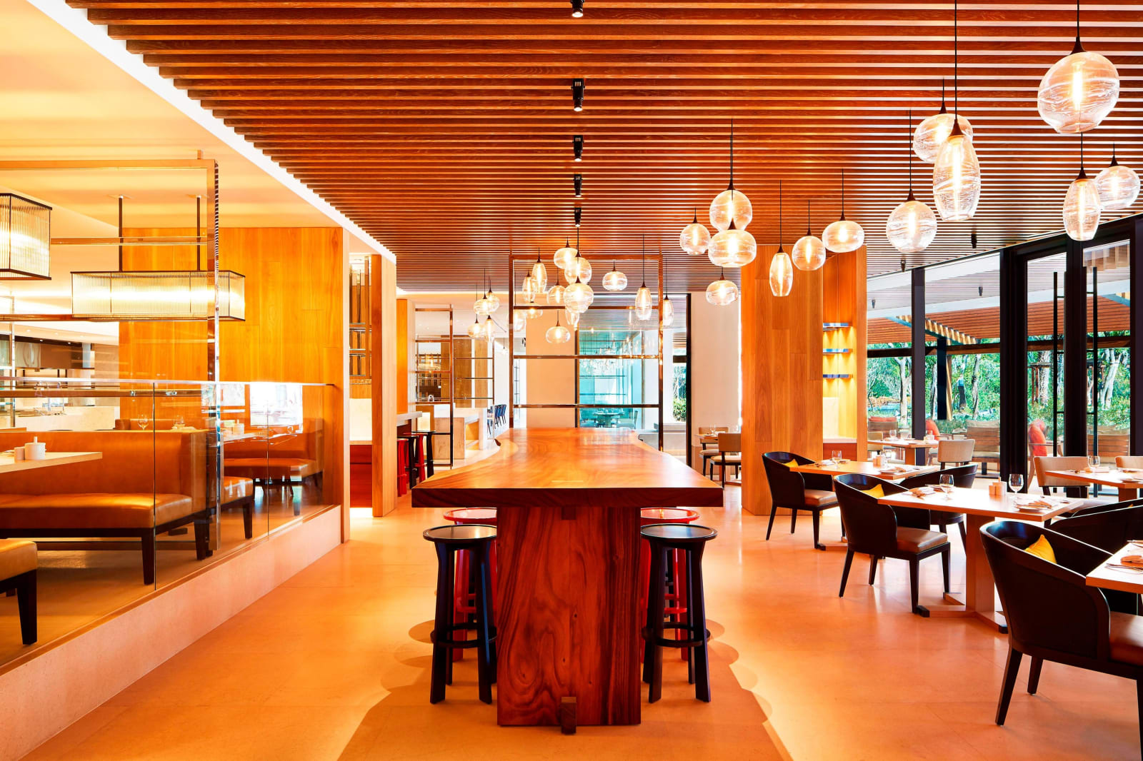 A first-floor dining room with slatted timber ceiling and counter seating
