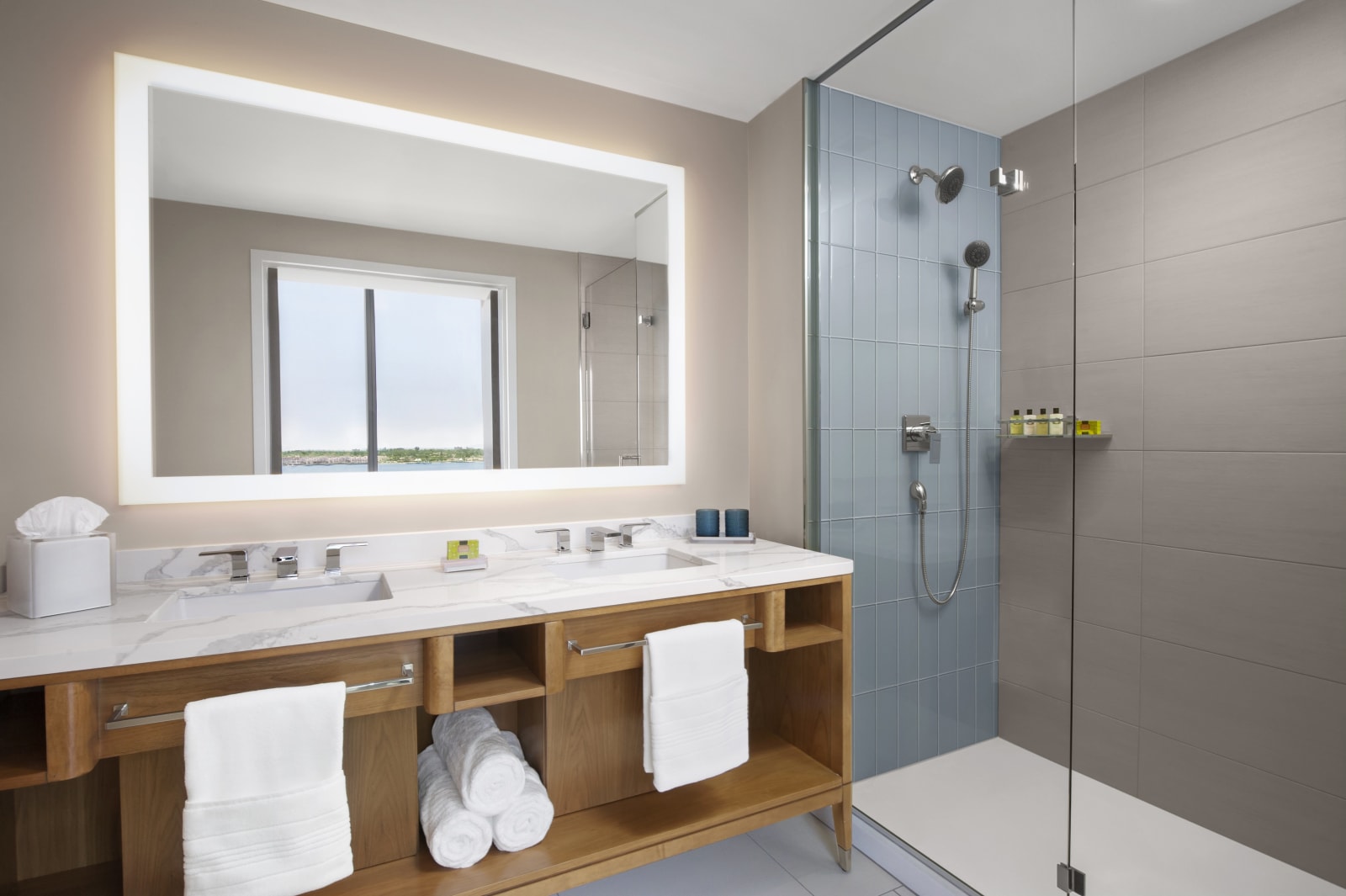 Double vanity bathroom with a walk-in shower and no tub