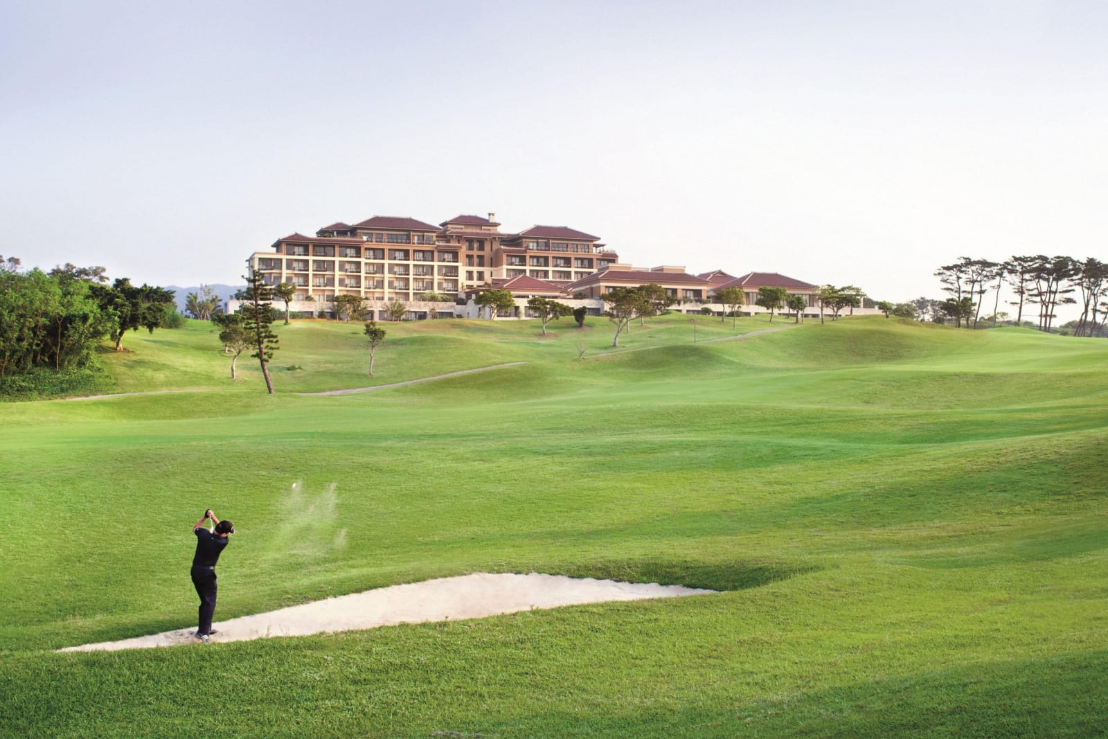 View from the hill over the fairways toward the sea