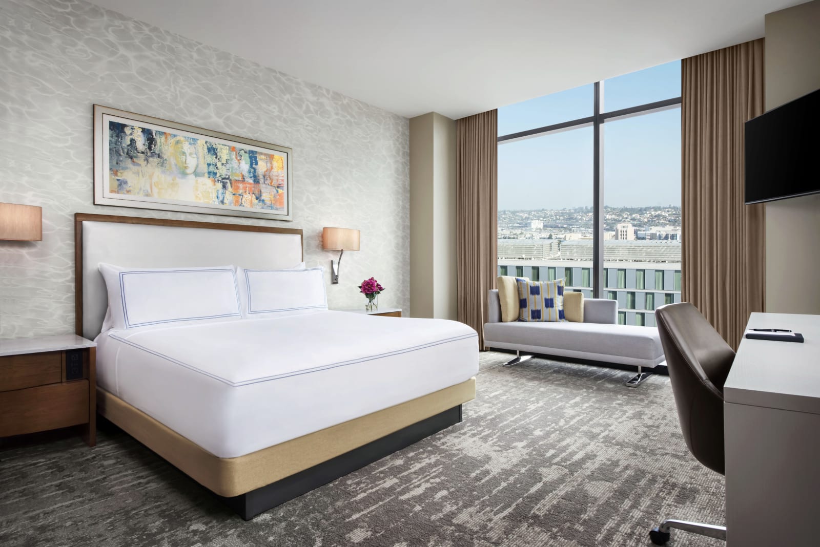 King room with floor to ceiling windows looking over San Diego Bay