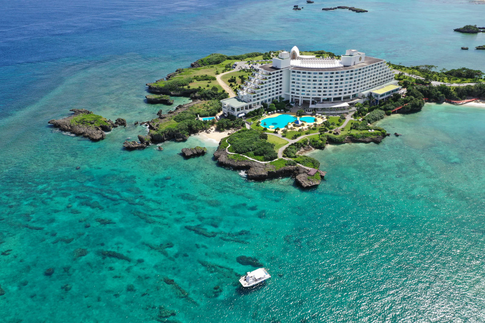 Aerial view of the resort on a coral headland surrounded by the East China Sea