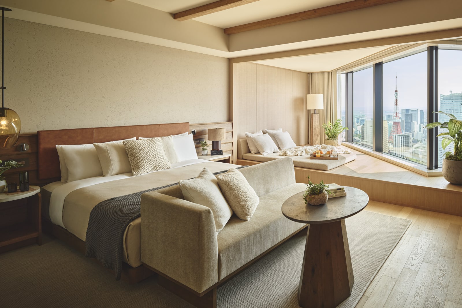 Panoramic Tower Studio Suite at 1 Hotel Tokyo, with Tokyo Tower framed in the wraparound window